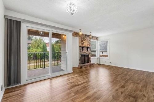 1491 Berkley Drive Nw, Calgary, AB - Indoor With Fireplace
