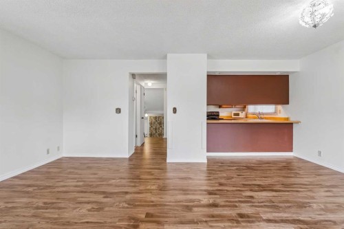 1491 Berkley Drive Nw, Calgary, AB - Indoor Photo Showing Other Room
