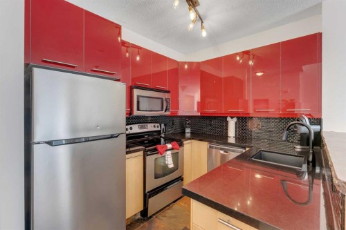 1707 23 Avenue Sw, Calgary, AB - Indoor Photo Showing Kitchen With Stainless Steel Kitchen