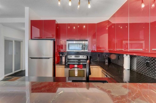 1707 23 Avenue Sw, Calgary, AB - Indoor Photo Showing Kitchen With Stainless Steel Kitchen