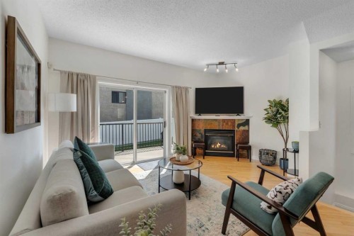 1707 23 Avenue Sw, Calgary, AB - Indoor Photo Showing Living Room With Fireplace