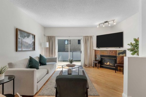 1707 23 Avenue Sw, Calgary, AB - Indoor Photo Showing Living Room With Fireplace