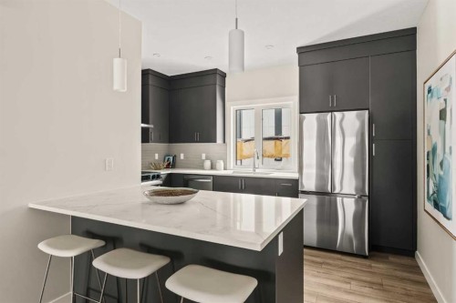  - Indoor Photo Showing Kitchen With Upgraded Kitchen