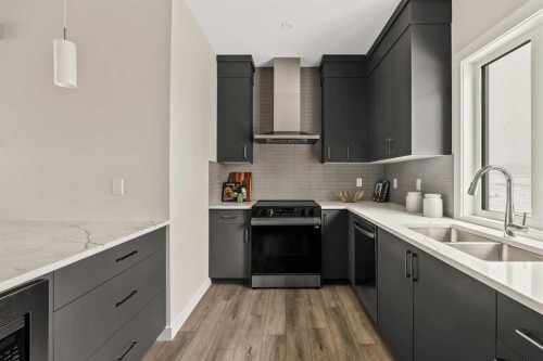  - Indoor Photo Showing Kitchen With Double Sink With Upgraded Kitchen