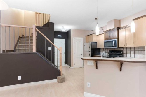 103-1606 4 Street Nw, Calgary, AB - Indoor Photo Showing Kitchen