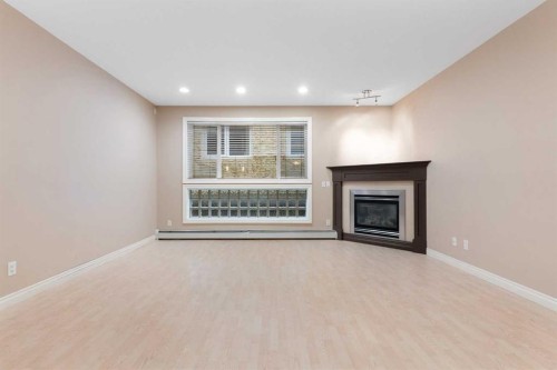 103-1606 4 Street Nw, Calgary, AB - Indoor With Fireplace