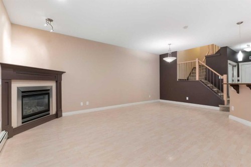 103-1606 4 Street Nw, Calgary, AB - Indoor With Fireplace