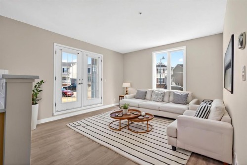 2102-333 Taravista Drive Ne, Calgary, AB - Indoor Photo Showing Living Room