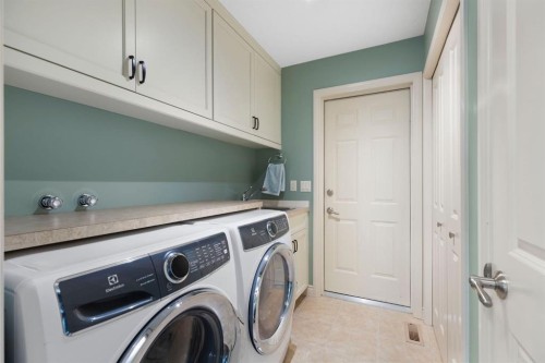 311 Woodhaven Bay Sw, Calgary, AB - Indoor Photo Showing Laundry Room
