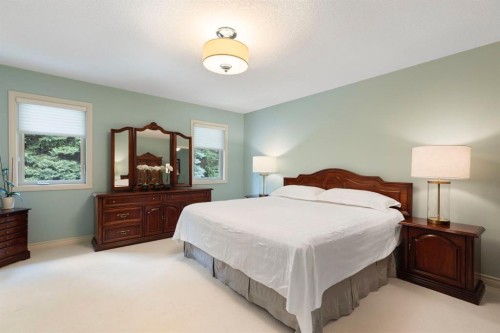 311 Woodhaven Bay Sw, Calgary, AB - Indoor Photo Showing Bedroom