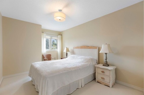 311 Woodhaven Bay Sw, Calgary, AB - Indoor Photo Showing Bedroom