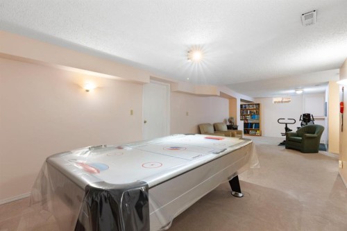 311 Woodhaven Bay Sw, Calgary, AB - Indoor Photo Showing Other Room