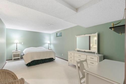 311 Woodhaven Bay Sw, Calgary, AB - Indoor Photo Showing Bedroom