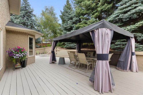 311 Woodhaven Bay Sw, Calgary, AB - Outdoor With Deck Patio Veranda With Exterior