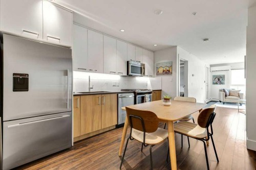 128-510 Edmonton Trail Ne, Calgary, AB - Indoor Photo Showing Kitchen With Stainless Steel Kitchen