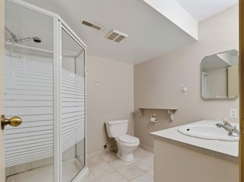 76 Deermoss Crescent Se, Calgary, AB - Indoor Photo Showing Bathroom