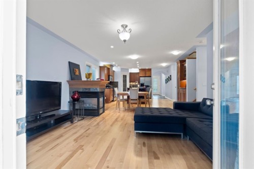 2323 5 Avenue Nw, Calgary, AB - Indoor Photo Showing Living Room With Fireplace