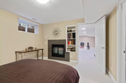 2323 5 Avenue Nw, Calgary, AB - Indoor With Fireplace