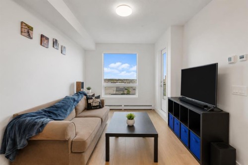 2509-8500 19 Avenue Se, Calgary, AB - Indoor Photo Showing Living Room