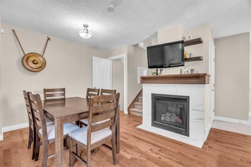 2-821 Mcdougall Road Ne, Calgary, AB - Indoor With Fireplace
