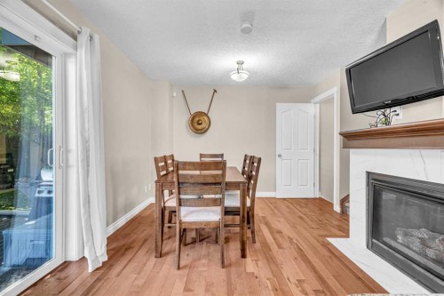2-821 Mcdougall Road Ne, Calgary, AB - Indoor With Fireplace