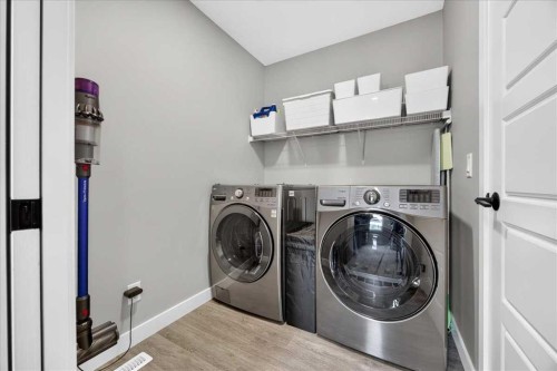 154 Masters Row Se, Calgary, AB - Indoor Photo Showing Laundry Room
