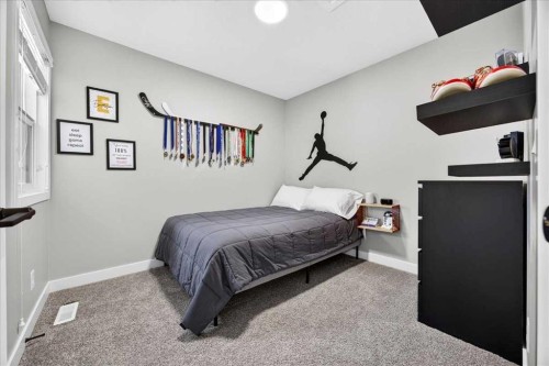 154 Masters Row Se, Calgary, AB - Indoor Photo Showing Bedroom