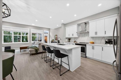 154 Masters Row Se, Calgary, AB - Indoor Photo Showing Kitchen With Upgraded Kitchen