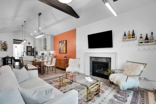 124-55 Fireside Circle, Cochrane, AB - Indoor Photo Showing Living Room With Fireplace