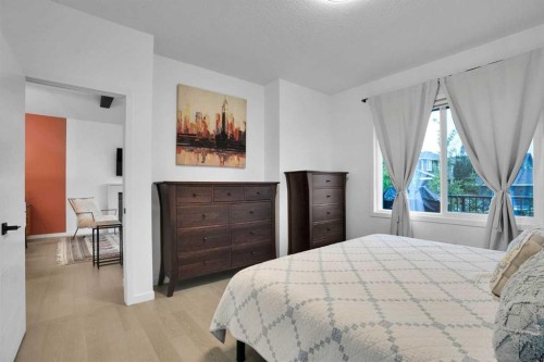 124-55 Fireside Circle, Cochrane, AB - Indoor Photo Showing Bedroom