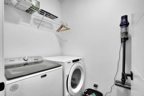 124-55 Fireside Circle, Cochrane, AB - Indoor Photo Showing Laundry Room