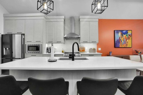 124-55 Fireside Circle, Cochrane, AB - Indoor Photo Showing Kitchen With Upgraded Kitchen