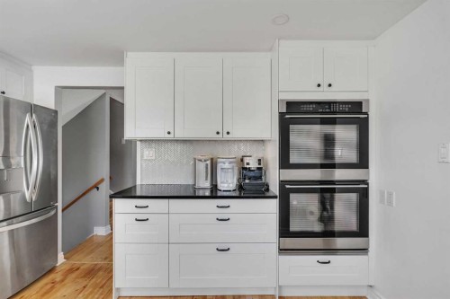 12 Oakvale Place Sw, Calgary, AB - Indoor Photo Showing Kitchen With Stainless Steel Kitchen