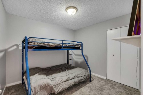 12 Oakvale Place Sw, Calgary, AB - Indoor Photo Showing Bedroom
