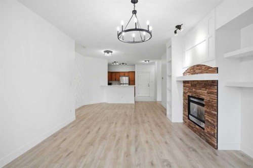 531-30 Discovery Ridge Close Sw, Calgary, AB - Indoor With Fireplace