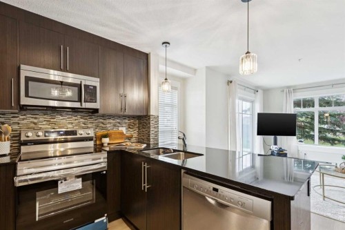 4108-155 Skyview Ranch Way Ne, Calgary, AB - Indoor Photo Showing Kitchen With Double Sink With Upgraded Kitchen