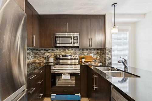 4108-155 Skyview Ranch Way Ne, Calgary, AB - Indoor Photo Showing Kitchen With Double Sink With Upgraded Kitchen