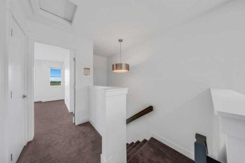 242 Carrington Gate Nw, Calgary, AB - Indoor Photo Showing Other Room