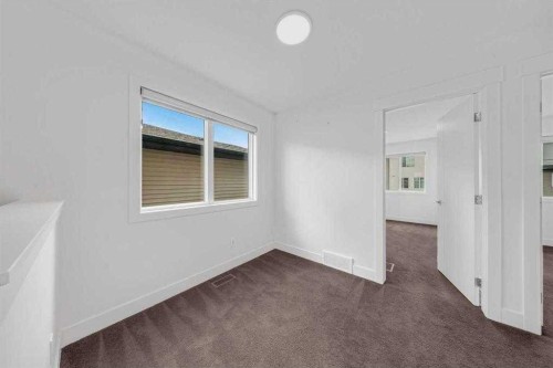 242 Carrington Gate Nw, Calgary, AB - Indoor Photo Showing Other Room