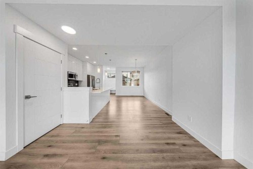 242 Carrington Gate Nw, Calgary, AB - Indoor Photo Showing Other Room