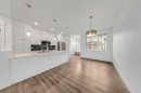 242 Carrington Gate Nw, Calgary, AB  - Indoor Photo Showing Kitchen With Upgraded Kitchen 