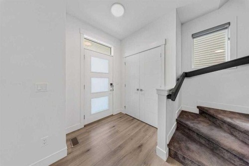 242 Carrington Gate Nw, Calgary, AB - Indoor Photo Showing Other Room