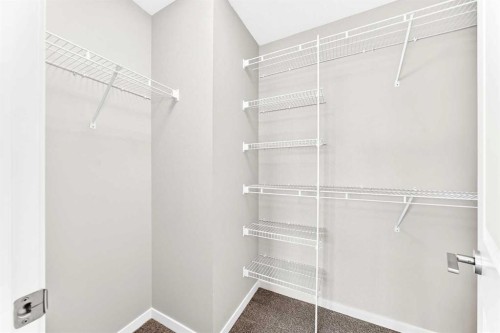 18 Willow Crescent, Okotoks, AB - Indoor With Storage