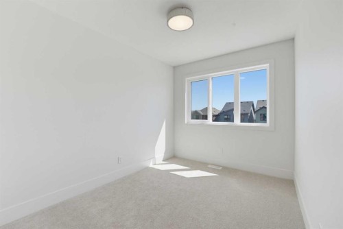 2465 Creeker Lane, Airdrie, AB - Indoor Photo Showing Other Room