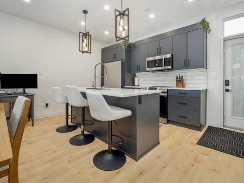 641 Blackwolf Boulevard North, Lethbridge, AB - Indoor Photo Showing Kitchen With Upgraded Kitchen
