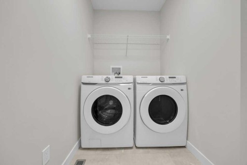 203 Homestead Common Ne, Calgary, AB - Indoor Photo Showing Laundry Room