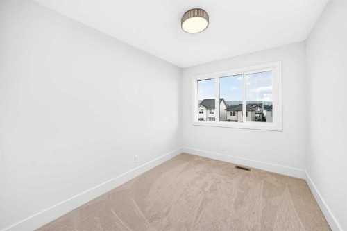 2473 Creeker Lane, Airdrie, AB - Indoor Photo Showing Other Room
