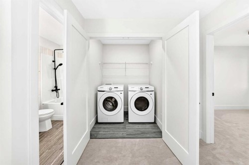 2473 Creeker Lane, Airdrie, AB - Indoor Photo Showing Laundry Room