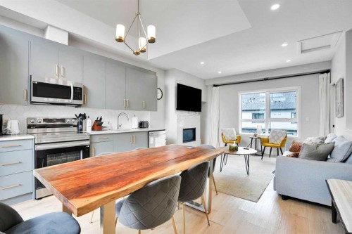 206-109 Kananaskis Way, Canmore, AB - Indoor With Fireplace