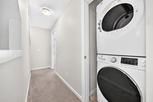 428 Cranbrook Square Se, Calgary, AB - Indoor Photo Showing Laundry Room